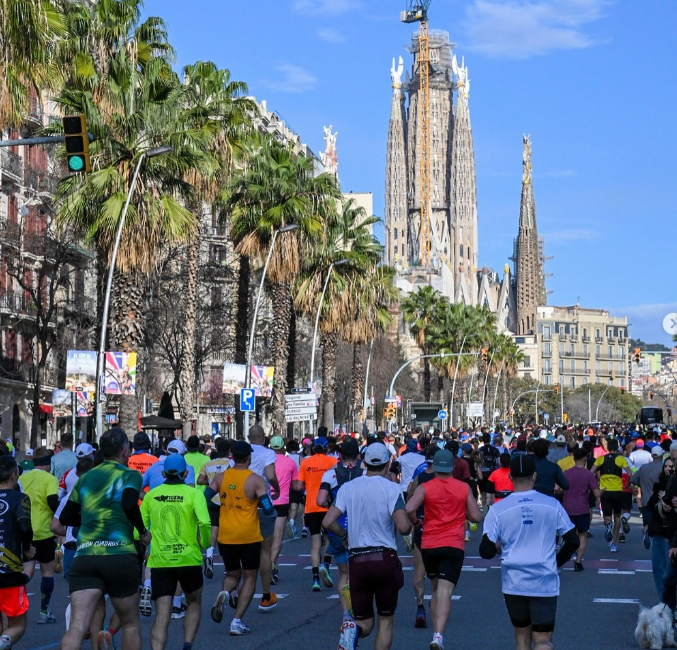 Runners gathered at the start line of the Barcelona Marathon, ready to begin the race.