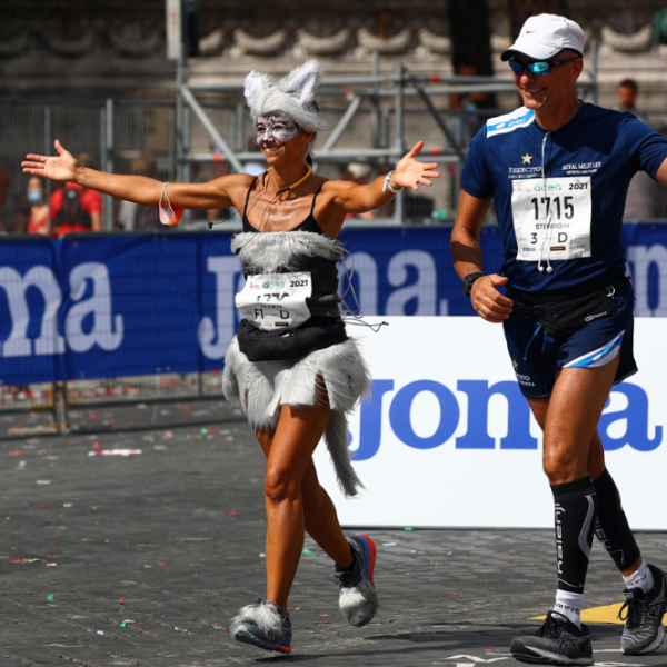 Marathon runners crossing a historic square in Rome